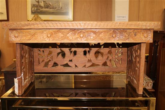 A Chinese carved low table W.63cm